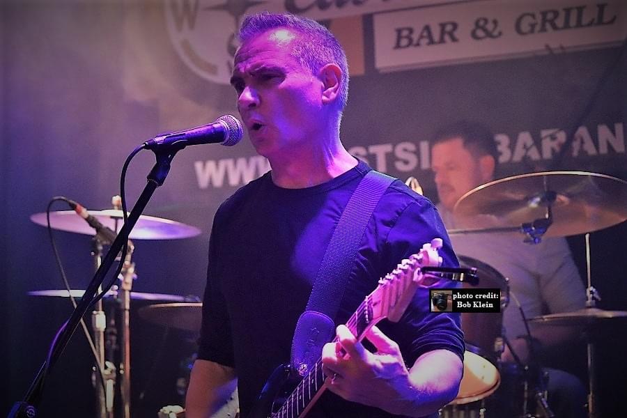 Sold For Sheep guitarist performing live