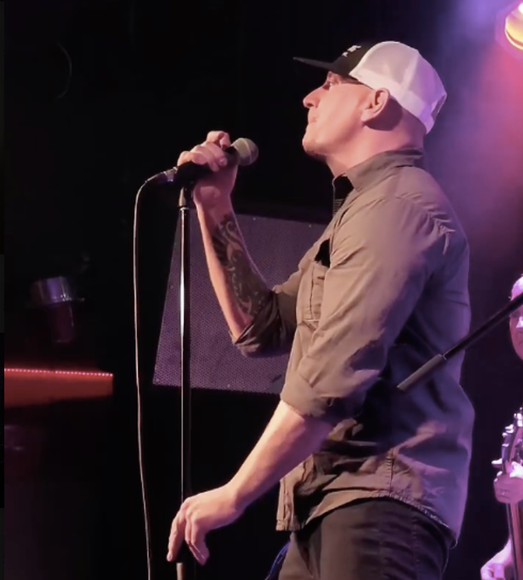 Sold For Sheep singer at the mic